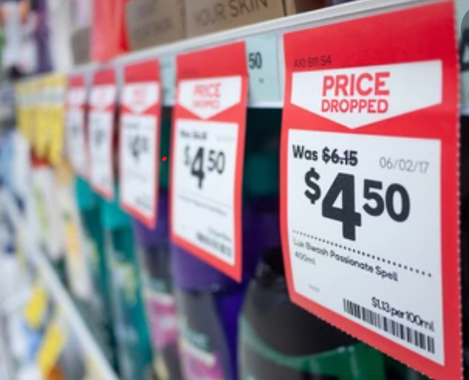A retail pricing sign being designed in barxui